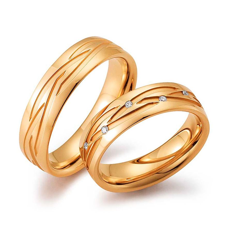 Обручальные кольца из красного золота с узором в виде плетения на заказ
