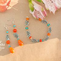 Комплект украшений для невесты в оранжево-бирюзовых цветах