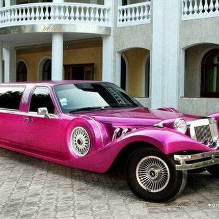 035 Лимузин ретро Excalibur розовый в аренду 