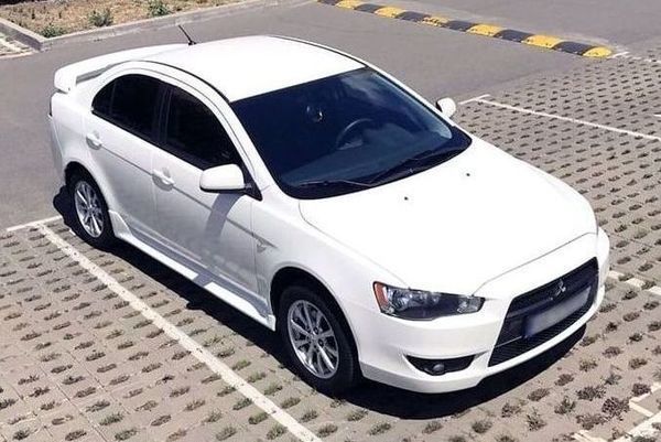 182 Mitsubishi Lancer белый аренда, 4 часа 